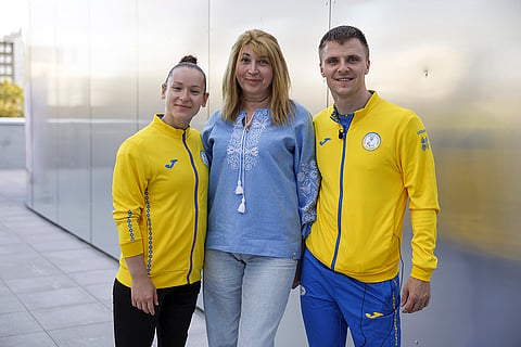 2024 Paris Paralympics: Oksana Kozyna, Svitlana Shabalina, and Oleksandr Chyrkov of Ukraine pose for a portrait
